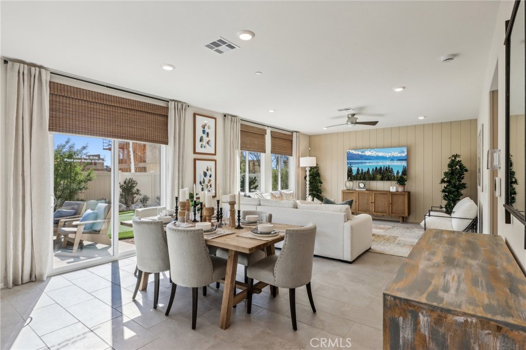 83239 Pintail Lane Indio, CA 92201 - Photo 10 of 45 a view of a dining room with furniture window and outside view