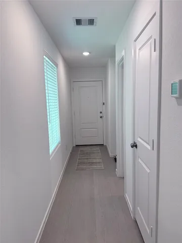 a view of hallway with window