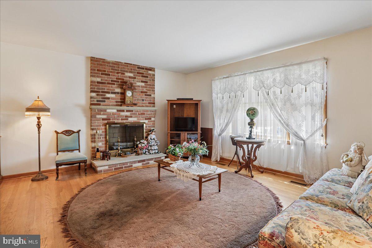 21909 Frederick Road Boyds, MD 20841 - Photo 4 of 20 Living room with fireplace