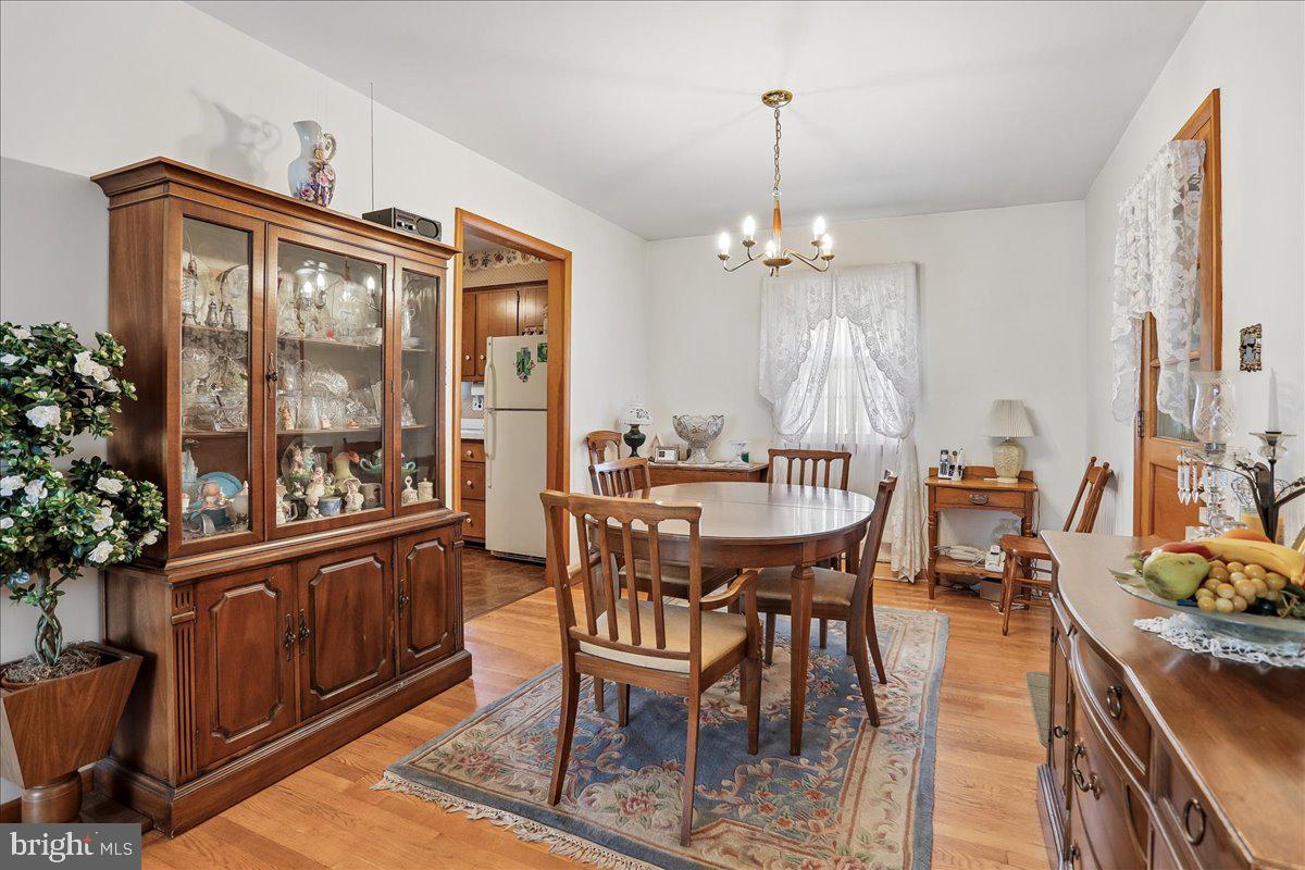 21909 Frederick Road Boyds, MD 20841 - Photo 6 of 20 Dining room with gleaming hardwood
