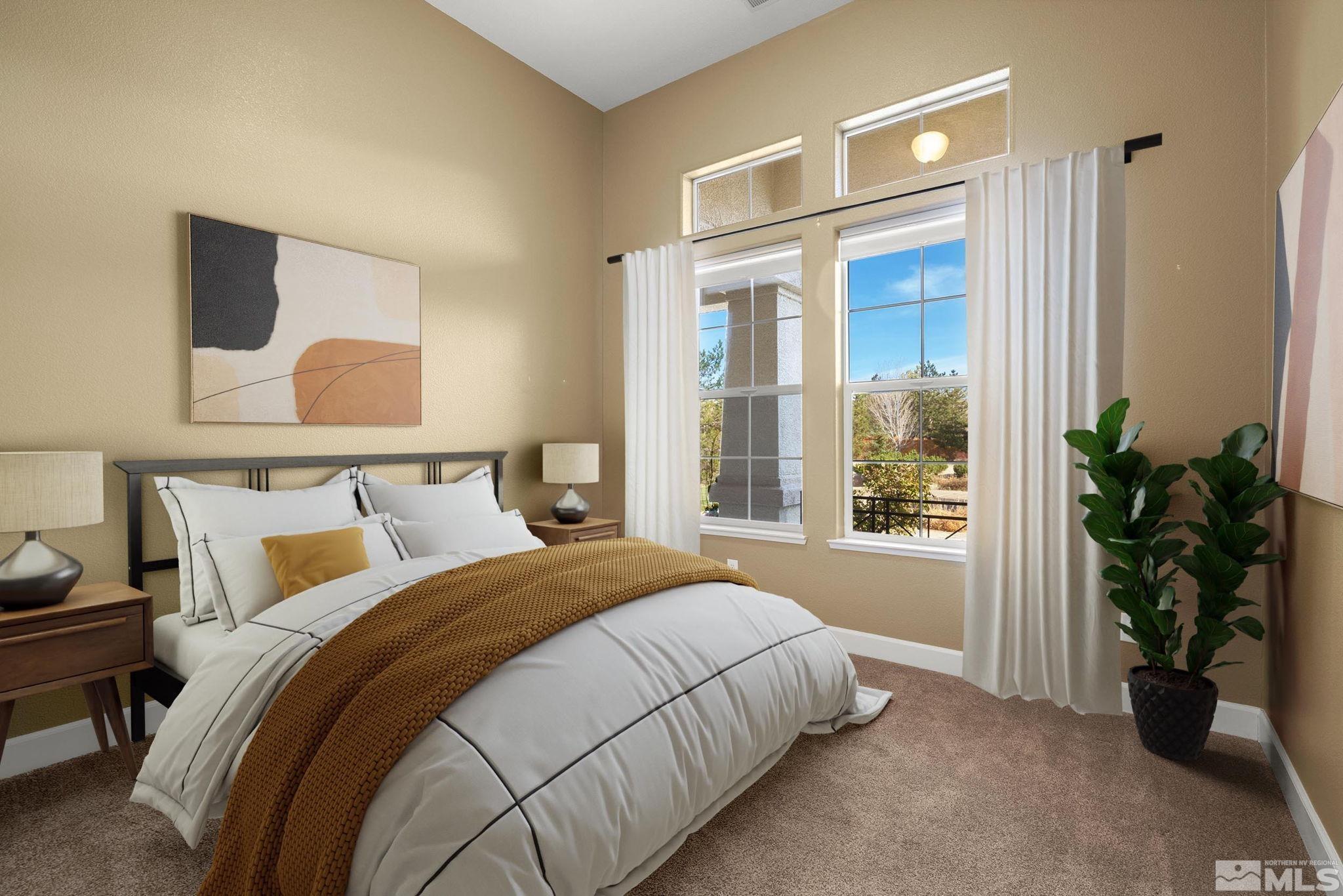 15300 Redmond Loop Reno, NV 89511 - Photo 25 of 38 a bedroom with a bed and a potted plant