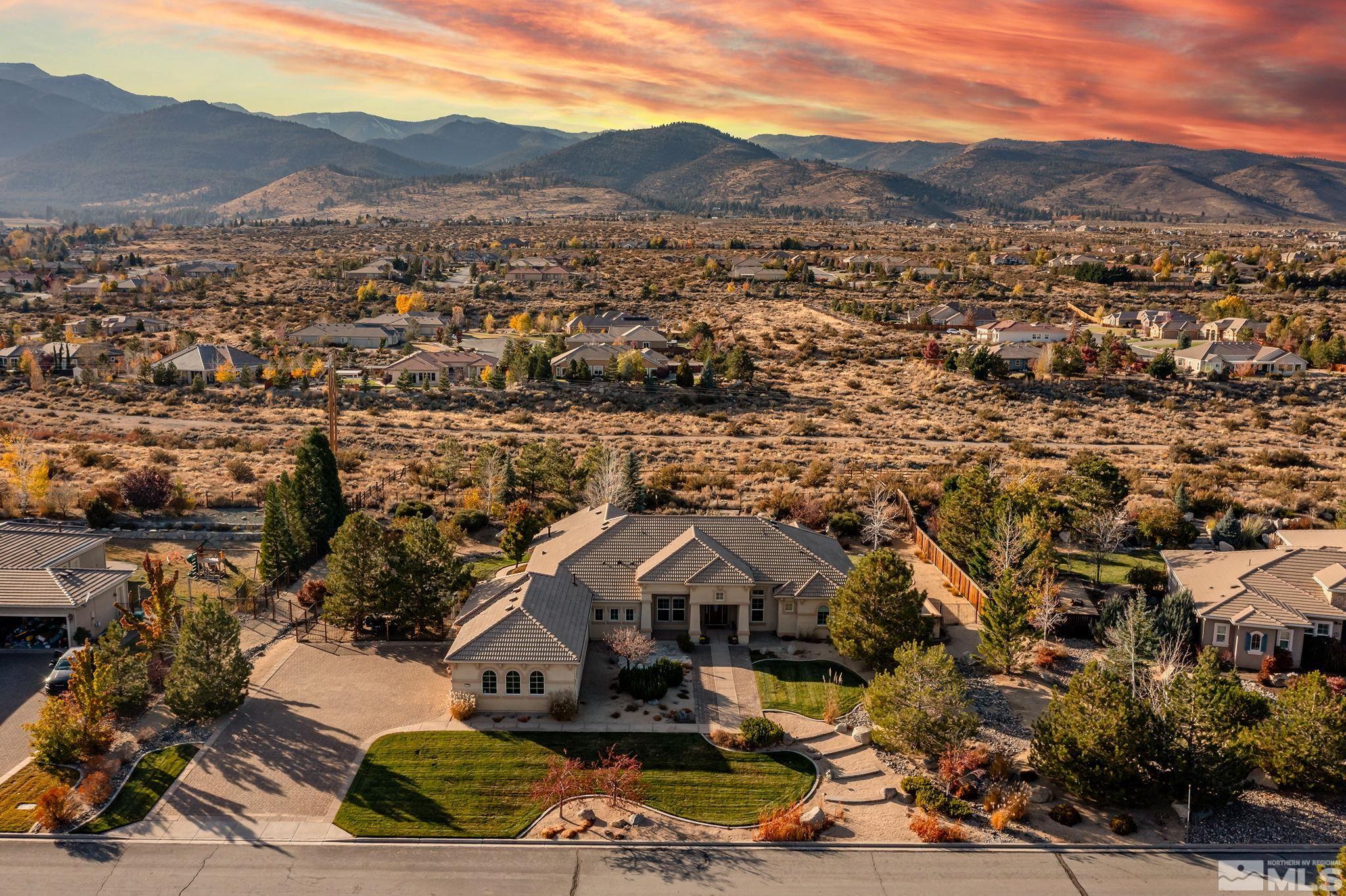 15300 Redmond Loop Reno, NV 89511 - Photo 3 of 38 an aerial view of residential houses with outdoor space and trees