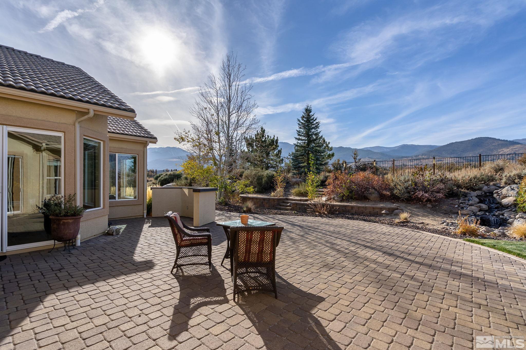 15300 Redmond Loop Reno, NV 89511 - Photo 32 of 38 a building outdoor space with patio furniture