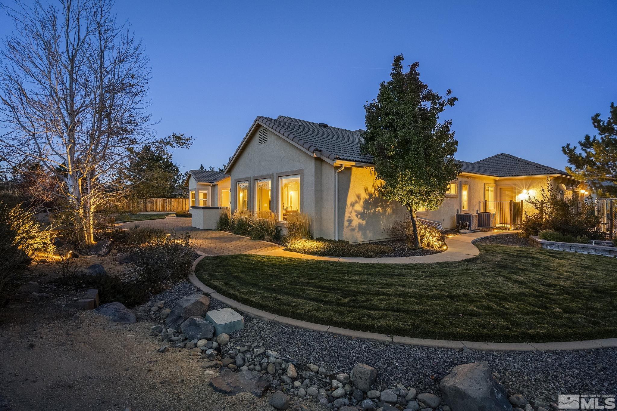 15300 Redmond Loop Reno, NV 89511 - Photo 35 of 38 a view of a house with backyard and garden