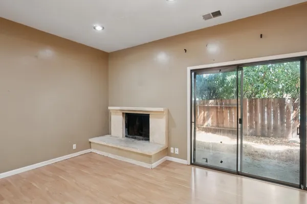 a view of entryway and hall with a front door