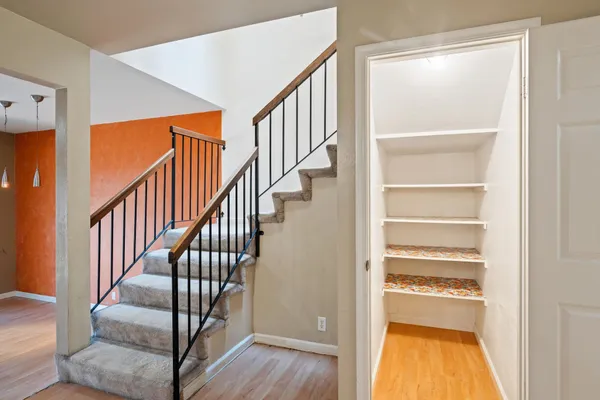 a view of a hallway with a window