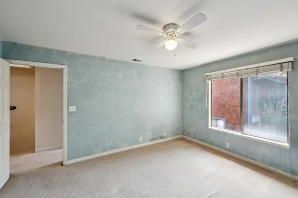 a bathroom with a sink toilet tub and shower