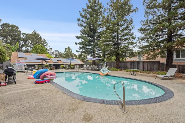a street sign on a pole on a street