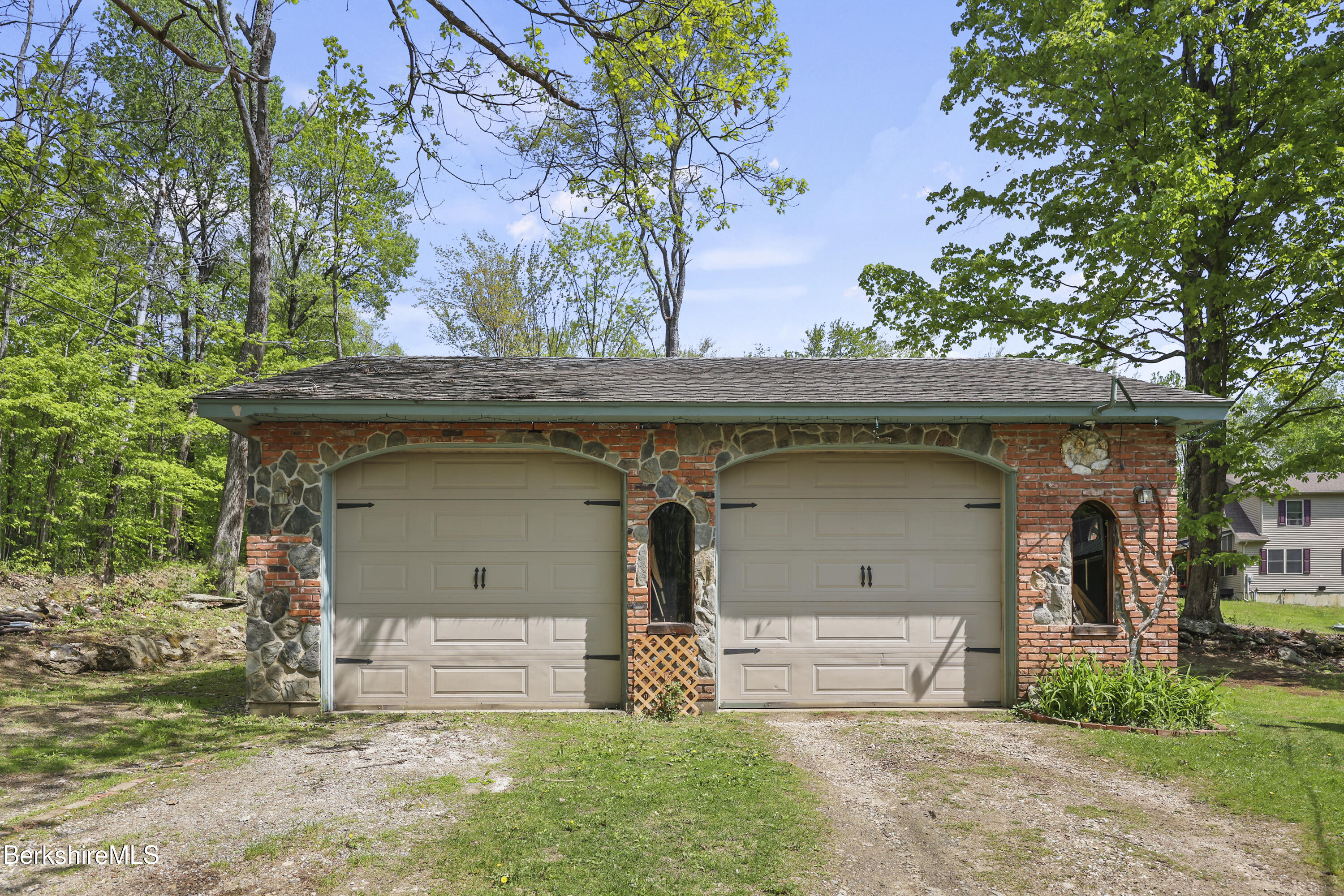 192 Curran Road Cheshire, MA 01225 - Photo 43 of 50 a front view of a house with garden
