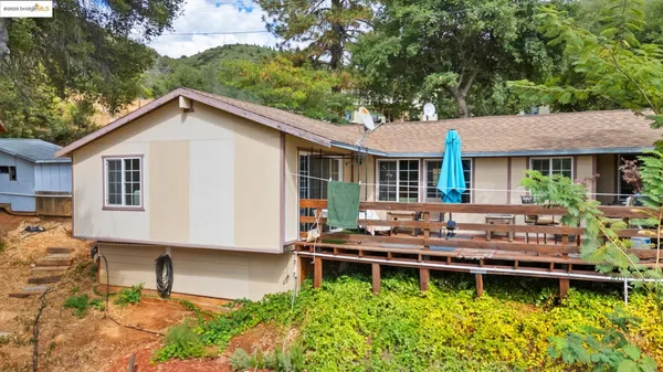 a house view with a garden space