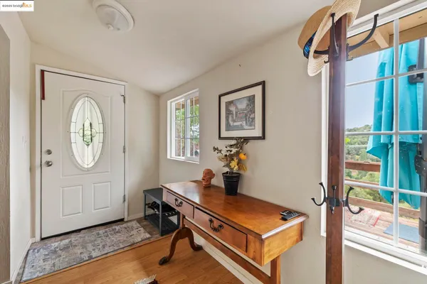 a room with furniture and a window