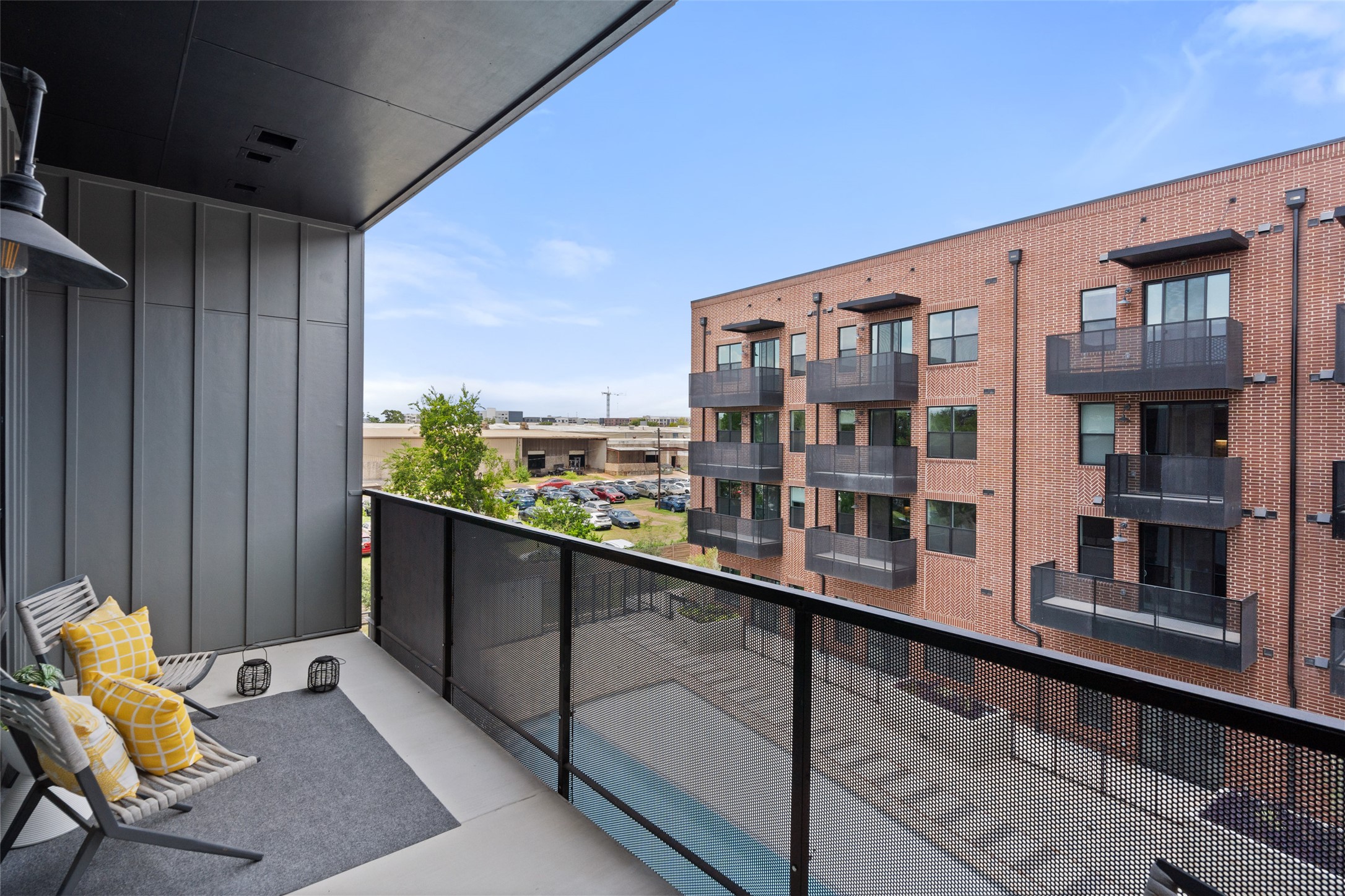 4510 Terry-O Lane, Unit 341 Austin, TX 78745 - Photo 1 of 40 This property features a private balcony with a metal railing and concrete flooring