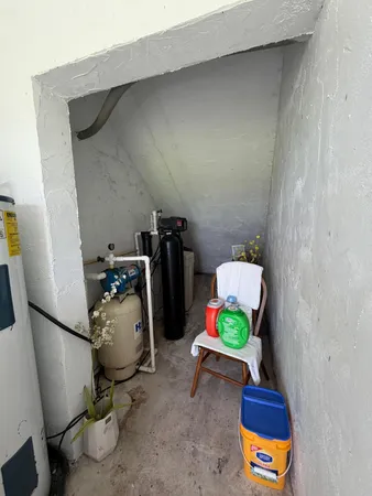 a kitchen with a sink and a stove