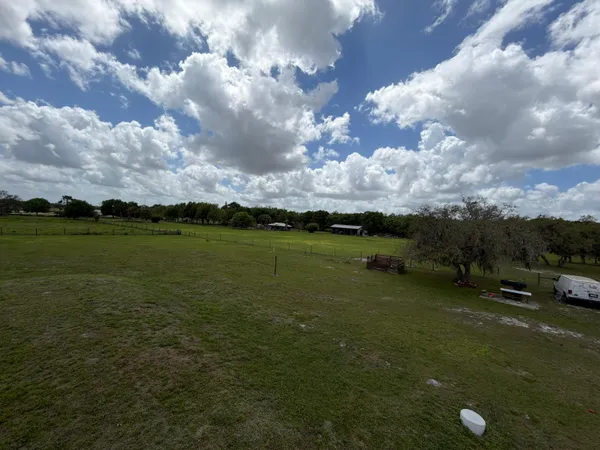 a view of a golf course with a garden