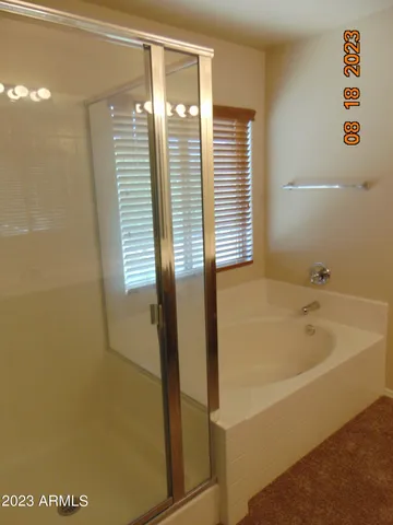 a bathroom with a toilet and a sink