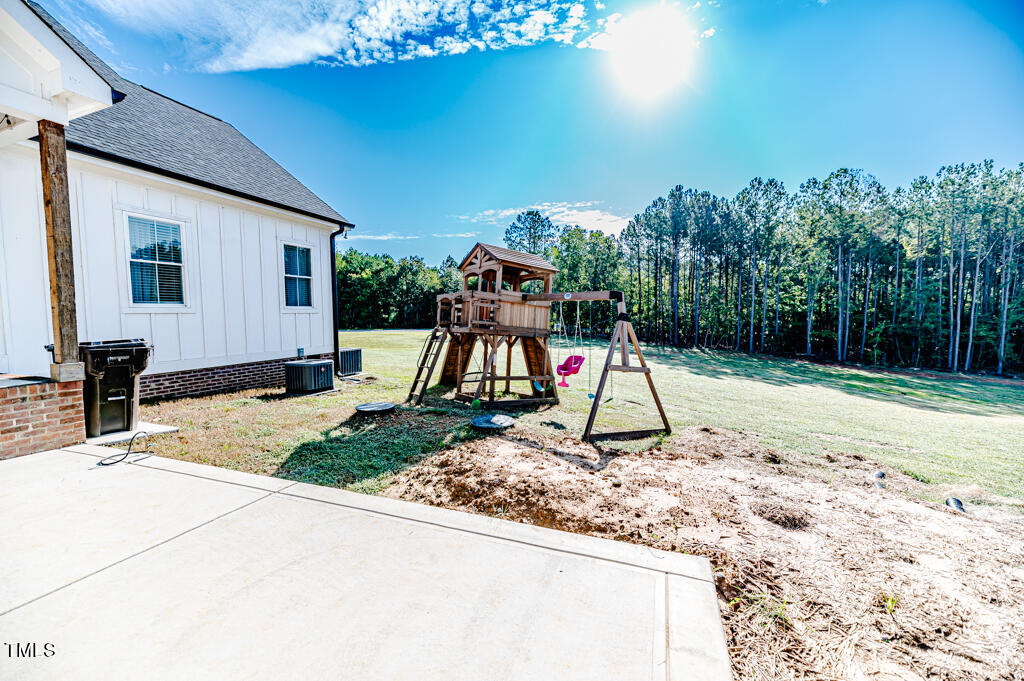 997 Jackson Road Fuquay-Varina, NC 27526 - Photo 40 of 75 a house view with a entertaining space