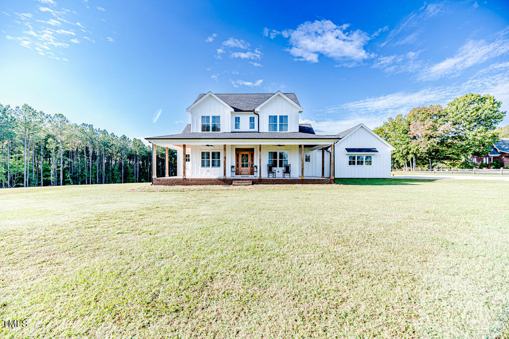 997 Jackson Road Fuquay-Varina, NC 27526 - Photo 4 of 75 a view of a house with a swimming pool