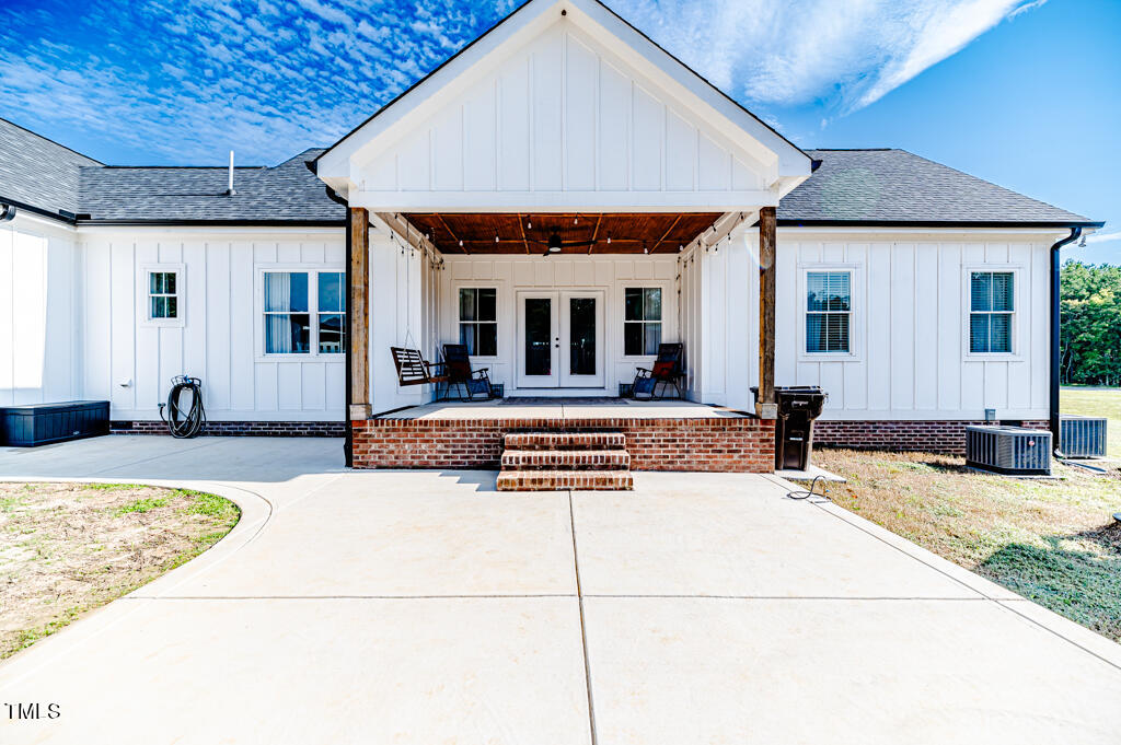 997 Jackson Road Fuquay-Varina, NC 27526 - Photo 41 of 75 a view of a house with backyard and swimming pool