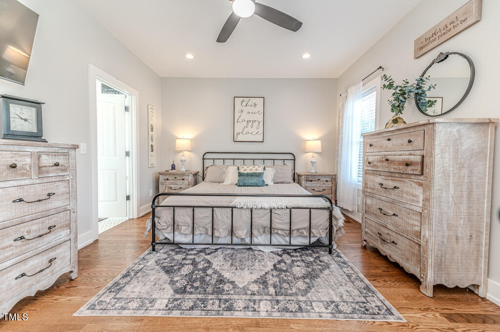 997 Jackson Road Fuquay-Varina, NC 27526 - Photo 47 of 75 a bedroom with a bed and a dresser