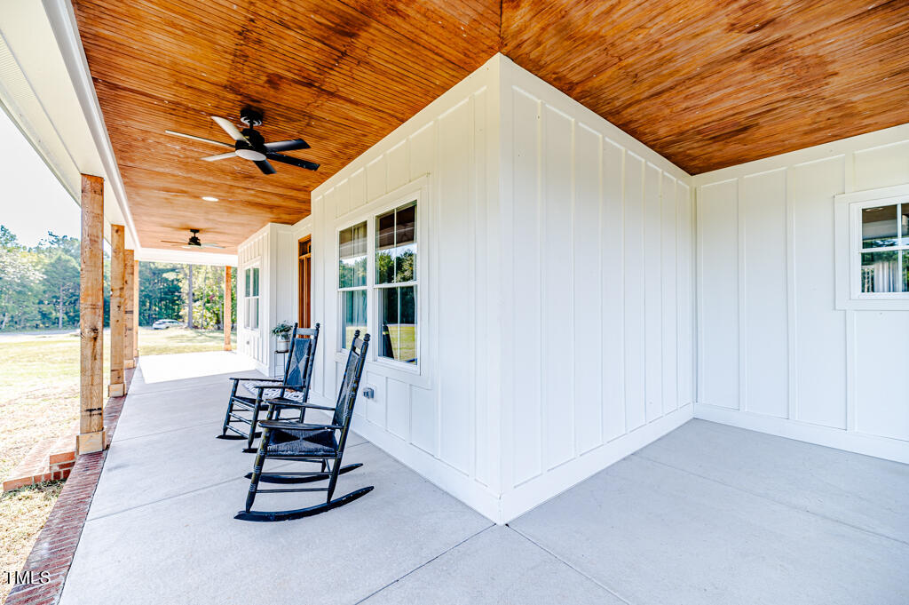 997 Jackson Road Fuquay-Varina, NC 27526 - Photo 5 of 75 a dining room with furniture and wooden floor