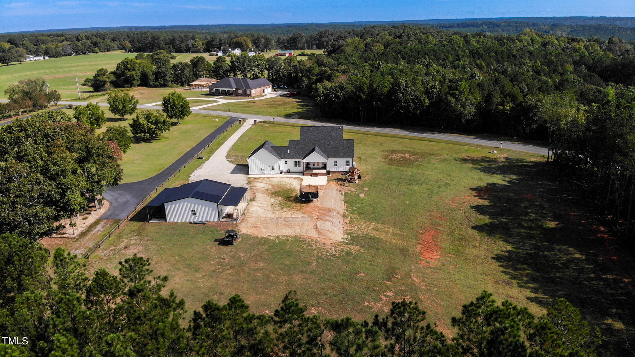 997 Jackson Road Fuquay-Varina, NC 27526 - Photo 67 of 75 a view of a lake with a yard