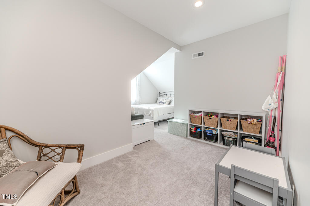 997 Jackson Road Fuquay-Varina, NC 27526 - Photo 71 of 75 a room with furniture and white walls