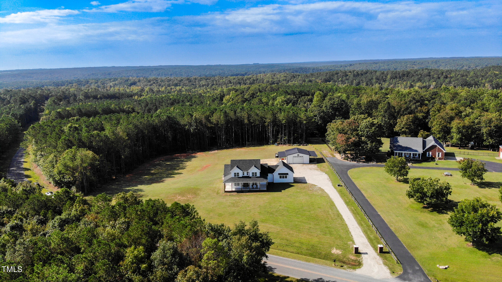 997 Jackson Road Fuquay-Varina, NC 27526 - Photo 10 of 75 a view of a swimming pool with a yard