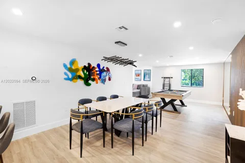 a view of a dining room kitchen and furniture