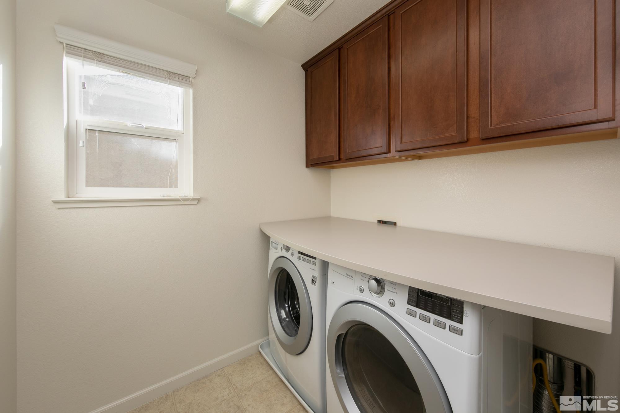 2093 Waterhouse Road Reno, NV 89521 - Photo 21 of 30 a utility room with dryer and washer