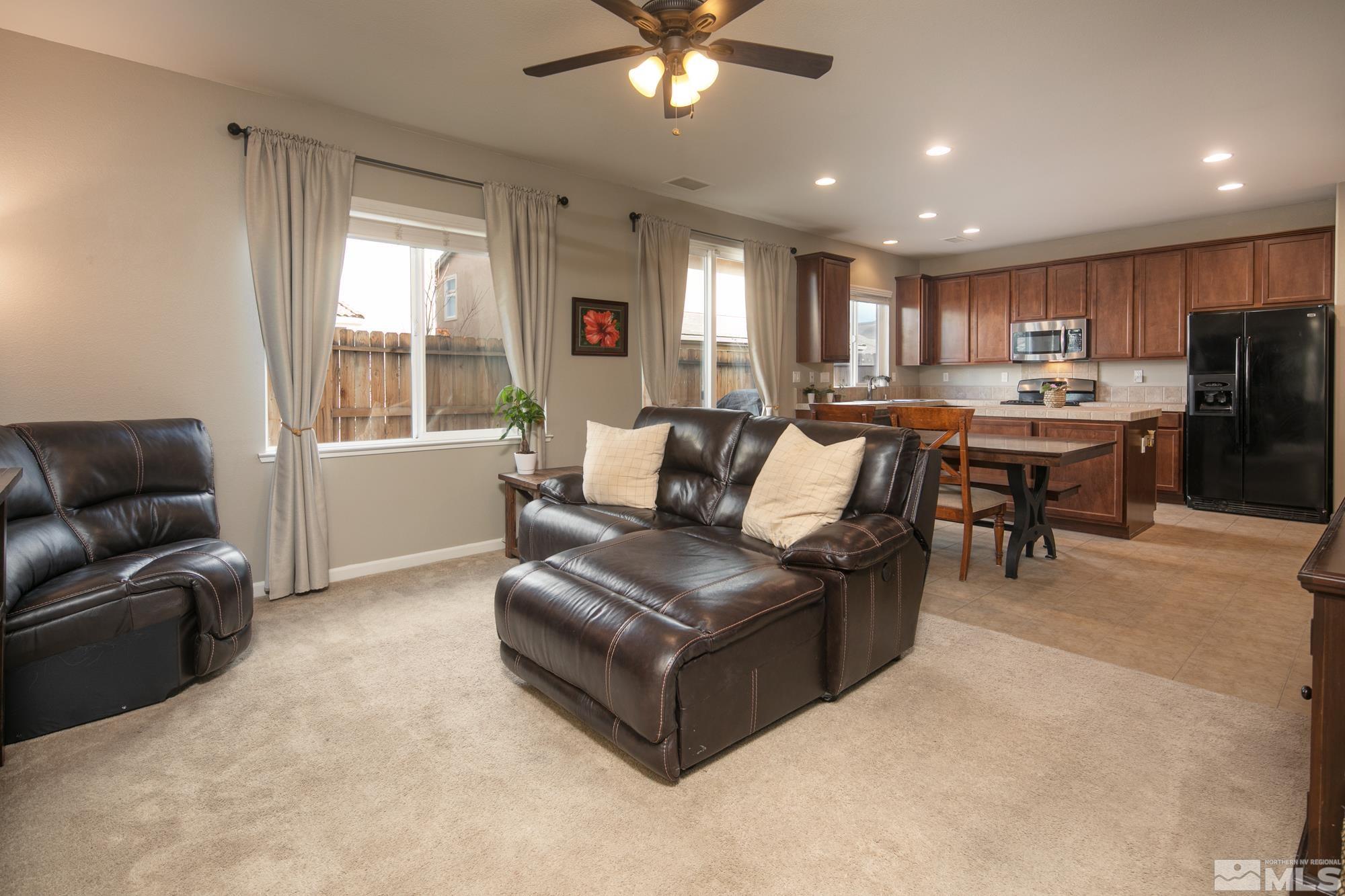 2093 Waterhouse Road Reno, NV 89521 - Photo 5 of 30 a living room with furniture and a large window