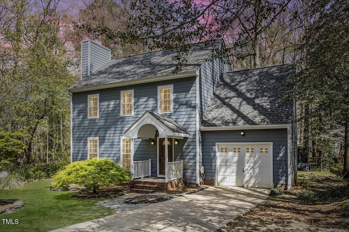 4725 Sinclair Drive Raleigh, NC 27616 - Photo 3 of 36 a front view of a house with garden