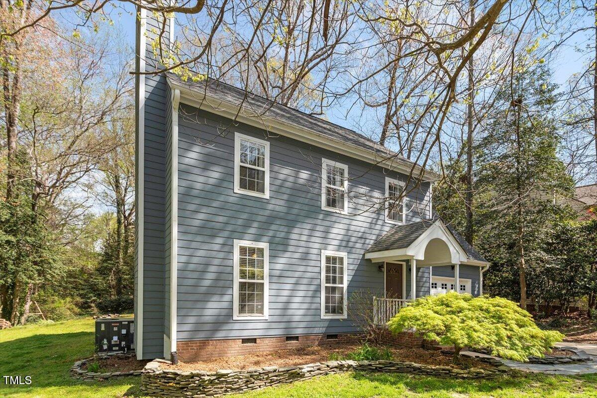 4725 Sinclair Drive Raleigh, NC 27616 - Photo 35 of 36 a front view of a house with a yard