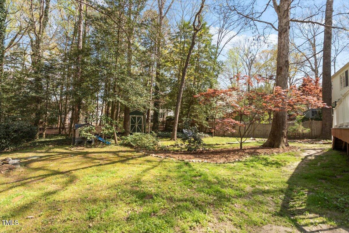 4725 Sinclair Drive Raleigh, NC 27616 - Photo 5 of 36 a view of outdoor space with trees