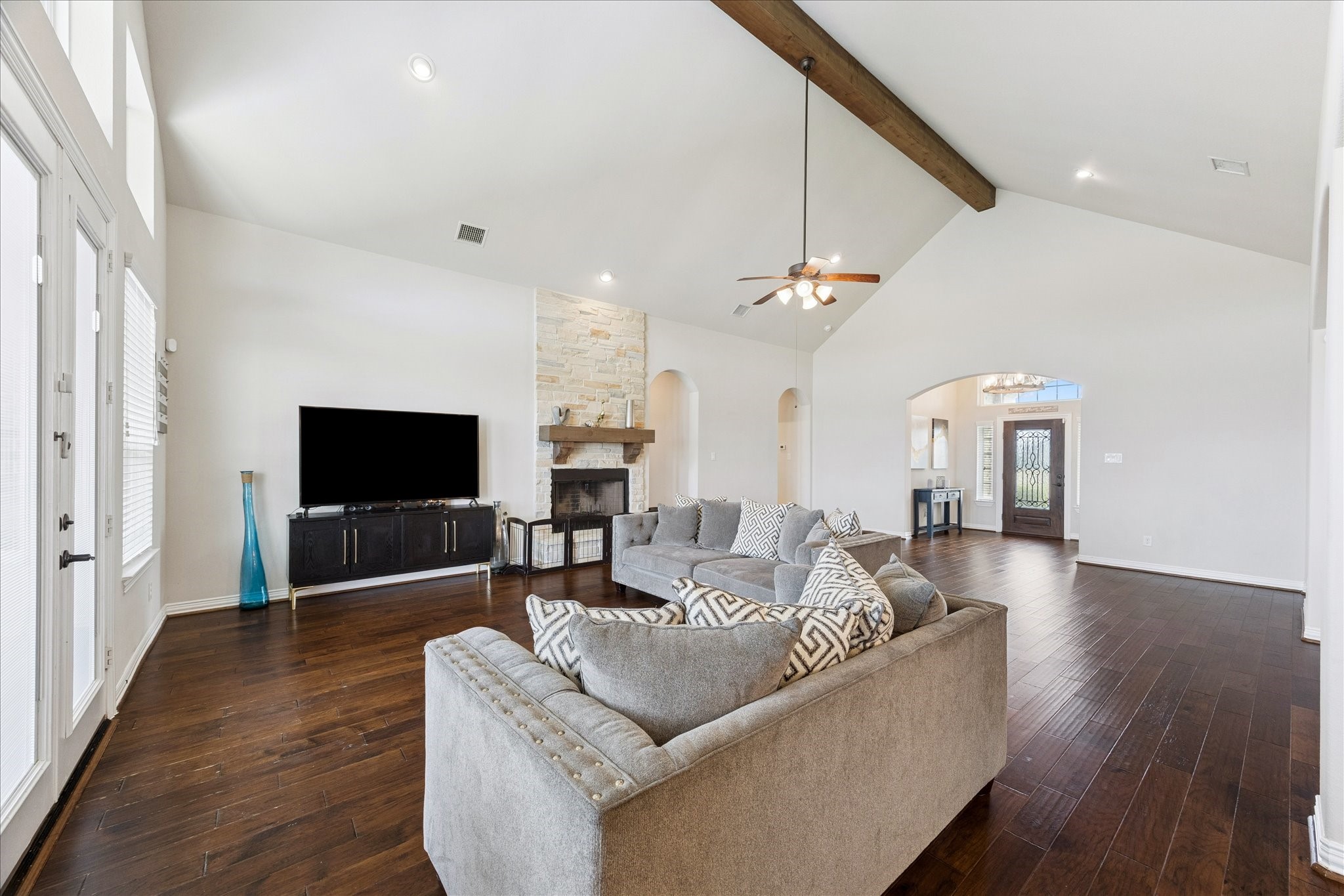 7923 Stratford Hall Drive Rosharon, TX 77583 - Photo 7 of 32 Vaulted ceiling with wood beam and recessed lighting.