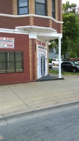 11700 South Michigan Avenue Chicago, IL 60628 - Photo 3 of 8 a view of a building with car parked