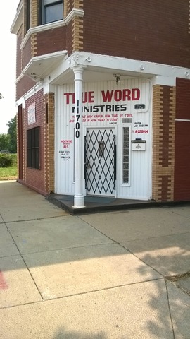 11700 South Michigan Avenue Chicago, IL 60628 - Photo 4 of 8 a front view of a building with retail shops