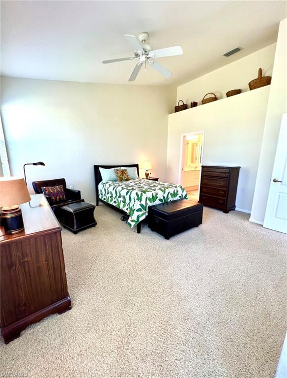 1957 Crestview Way, Unit 160 Naples, FL 34119 - Photo 18 of 32 a living room with furniture flowerpot and window