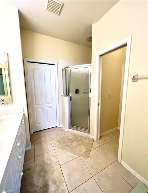 1957 Crestview Way, Unit 160 Naples, FL 34119 - Photo 20 of 32 a view of a bathroom with mirror