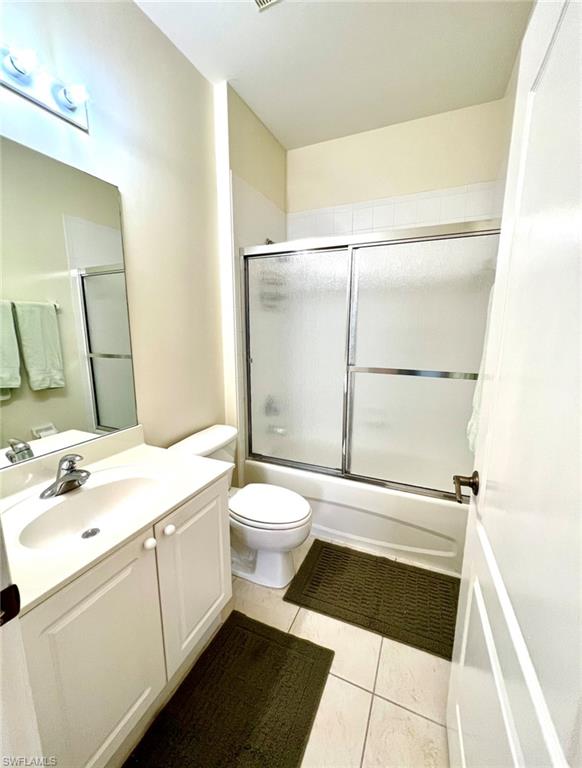 1957 Crestview Way, Unit 160 Naples, FL 34119 - Photo 22 of 32 a bathroom with a sink a toilet and shower