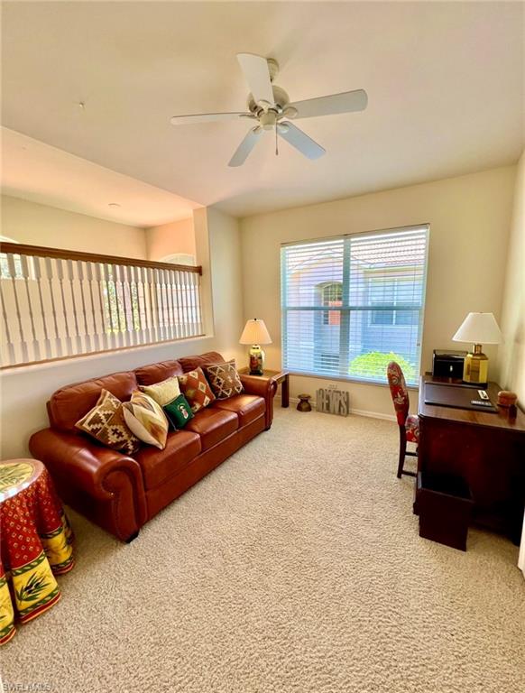 1957 Crestview Way, Unit 160 Naples, FL 34119 - Photo 24 of 32 a living room with furniture and a window