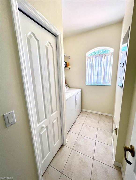 1957 Crestview Way, Unit 160 Naples, FL 34119 - Photo 25 of 32 a bathroom with a sink a toilet and a shower