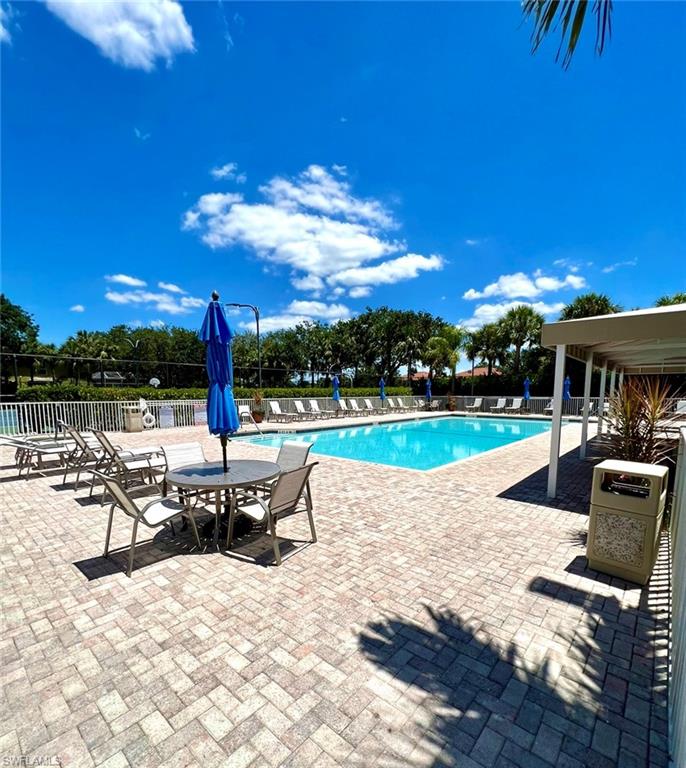 1957 Crestview Way, Unit 160 Naples, FL 34119 - Photo 30 of 32 a view of outdoor space with seating