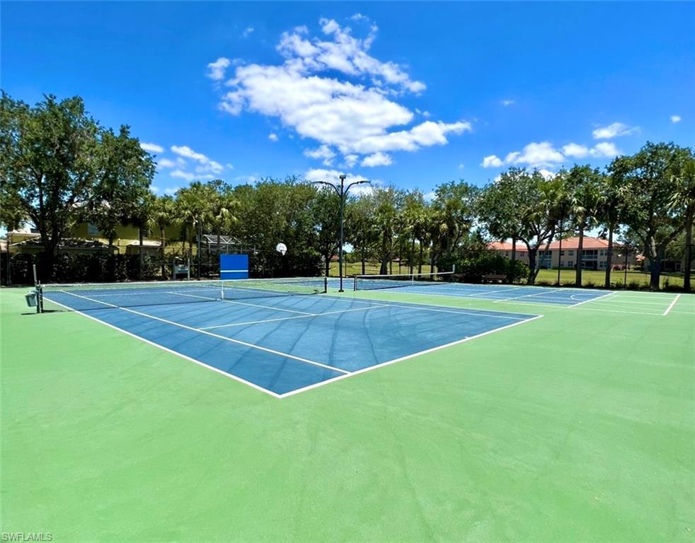 1957 Crestview Way, Unit 160 Naples, FL 34119 - Photo 31 of 32 a view of a basketball court