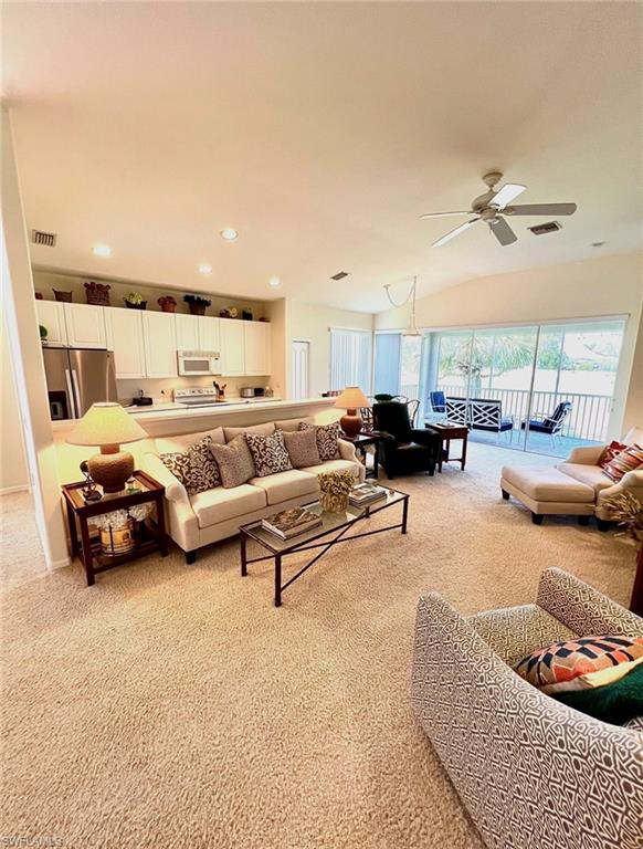 1957 Crestview Way, Unit 160 Naples, FL 34119 - Photo 7 of 32 a living room with furniture