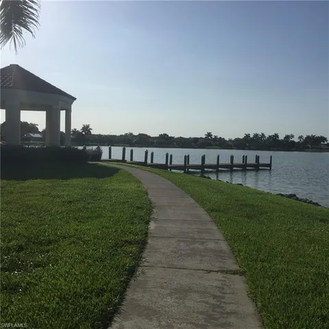 a view of a garden with a lake