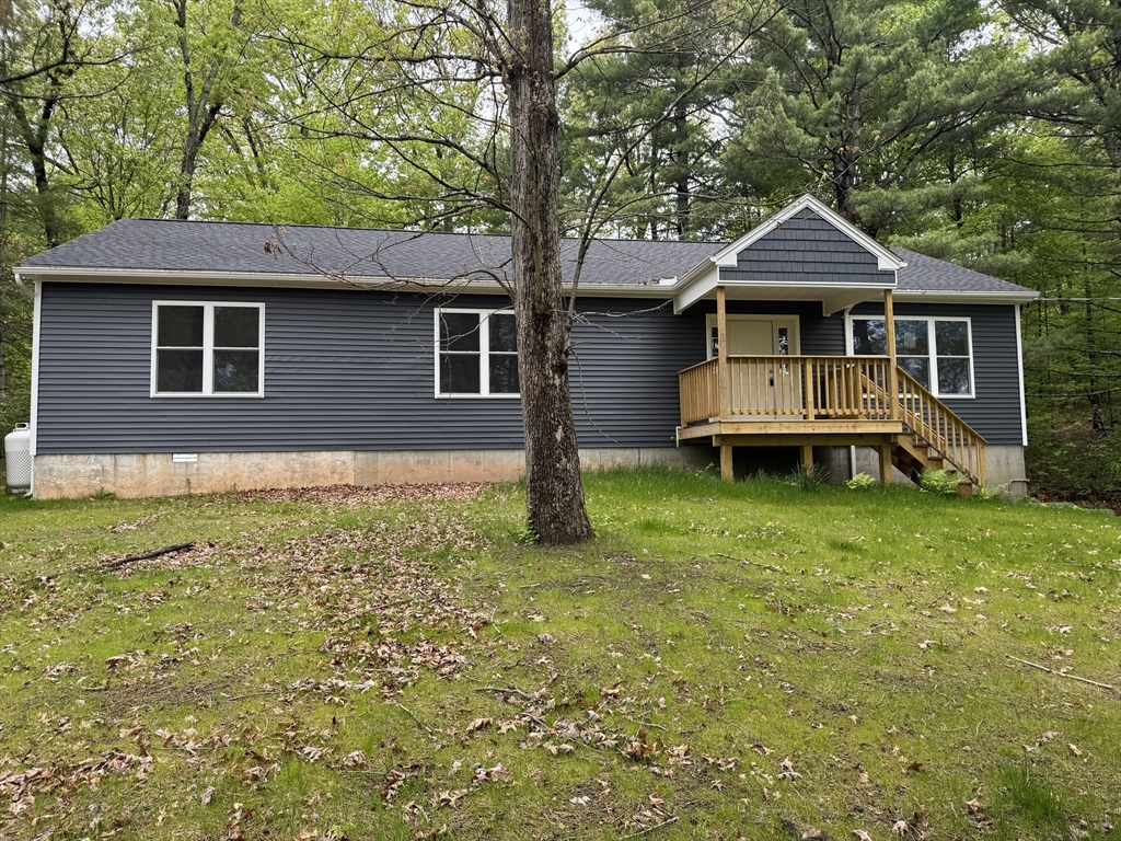 132 Kibbe Road East Longmeadow, MA 01028 - Photo 3 of 32 a front view of a house with garden
