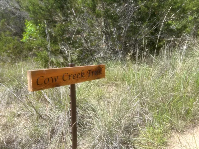 a sign that is sitting in front of a building
