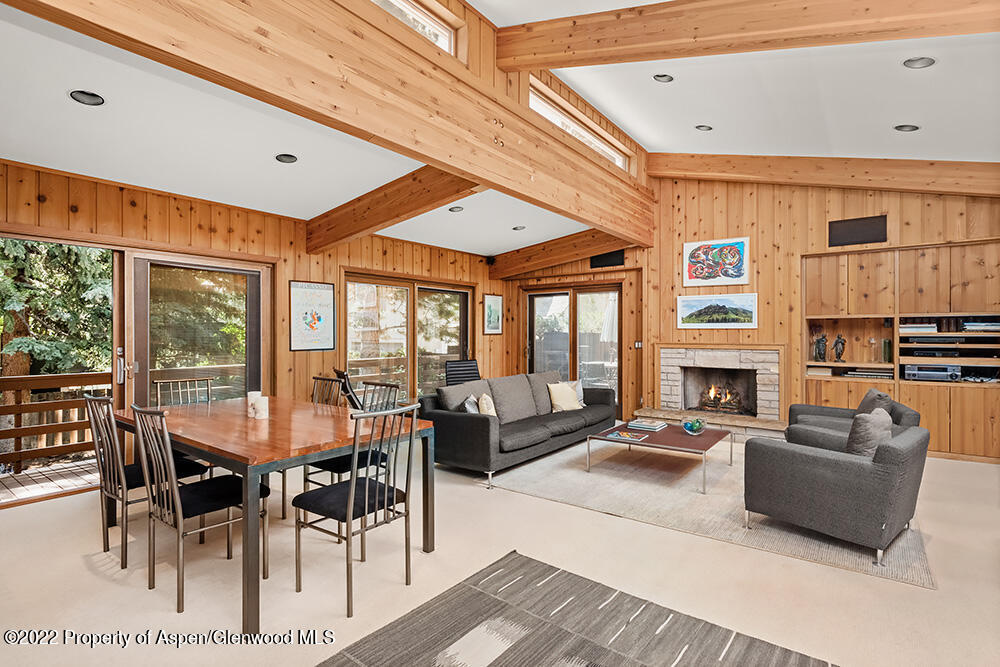 311 West North Street, Unit A Aspen, CO 81611 - Photo 4 of 39 a living room with fireplace furniture and a large window