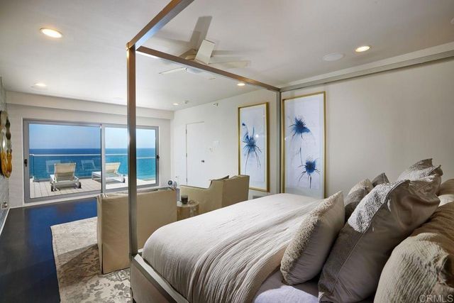 a view of living room with furniture and window