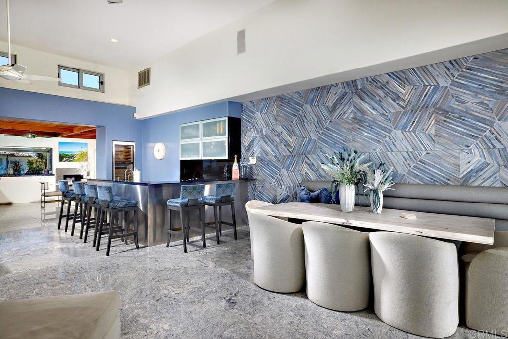 806 4th Street Encinitas, CA 92024 - Photo 2 of 47 a living room with furniture a fireplace and a flat screen tv